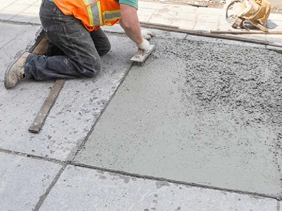 Professional repairing a concrete floor in Norfolk, VA